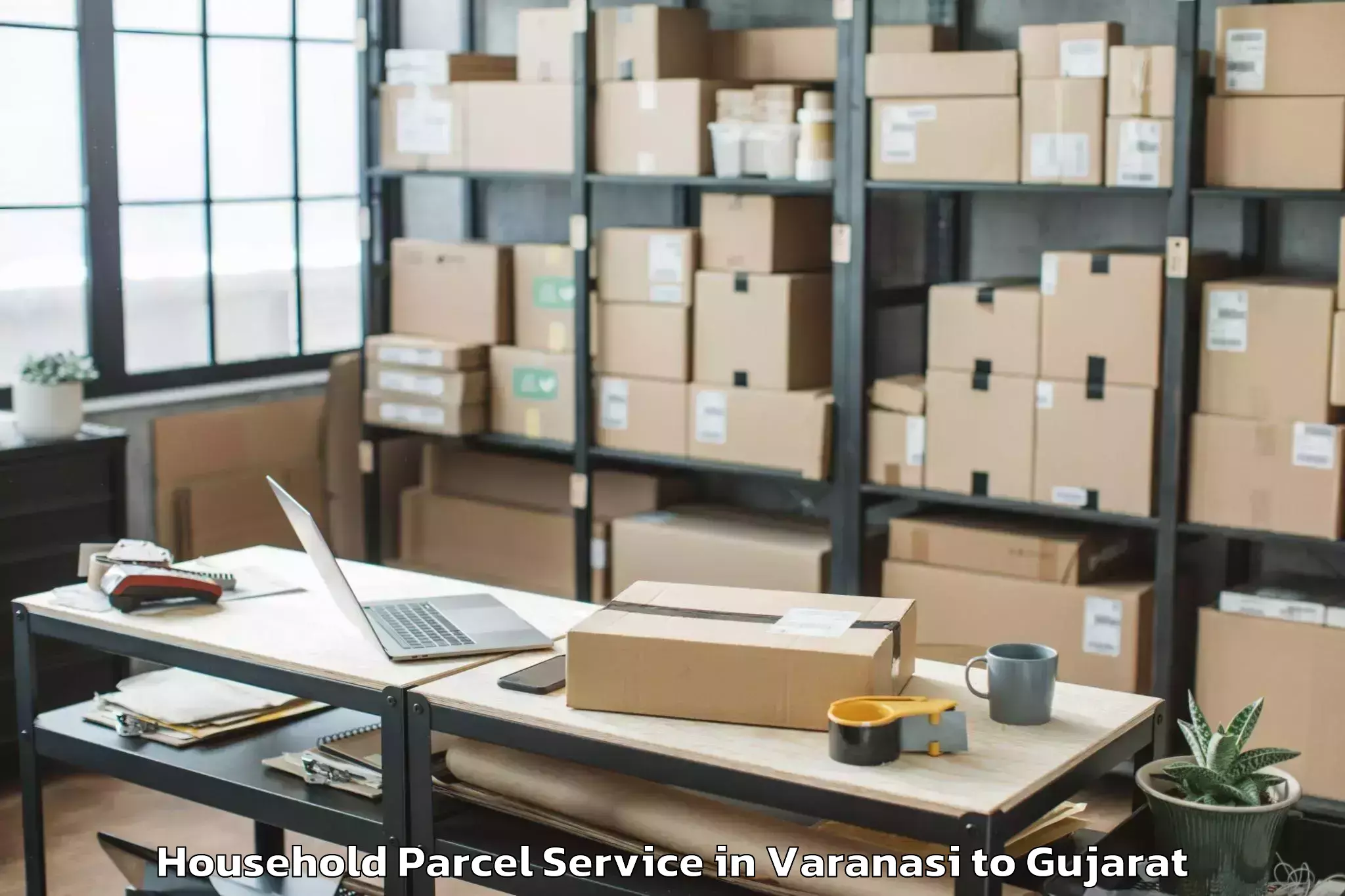 Professional Varanasi to Khedbrahma Household Parcel